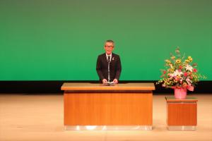 主催者あいさつを行う久道（ひさみち）区長