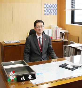 長谷川区長写真（縦）
