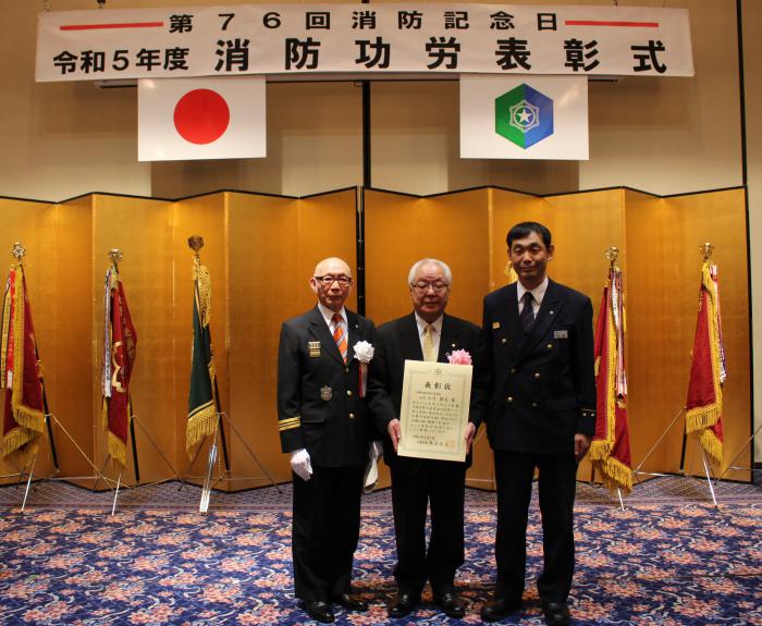 山内会長の記念撮影の写真